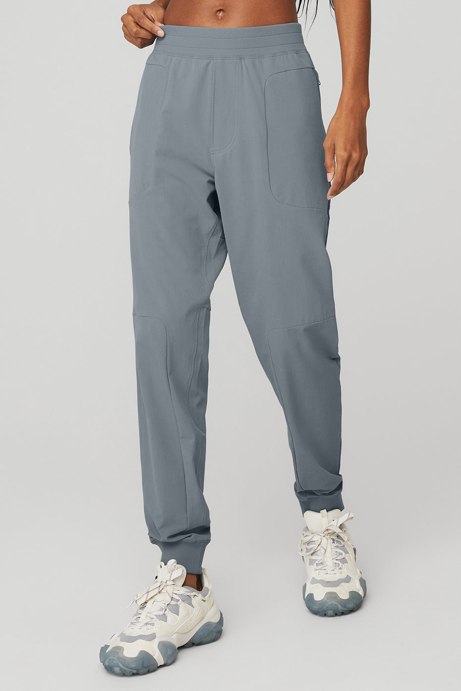 Co-Op Pants in Steel Blue by Alo Yoga