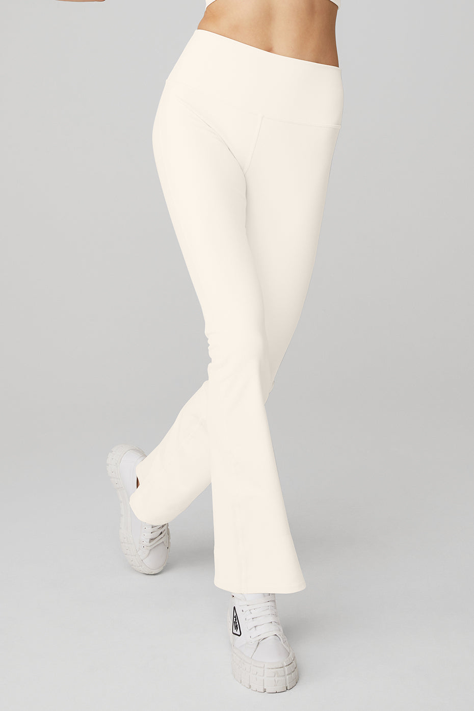 Airbrush High-Waist 7/8 Bootcut Legging in Ivory by Alo Yoga